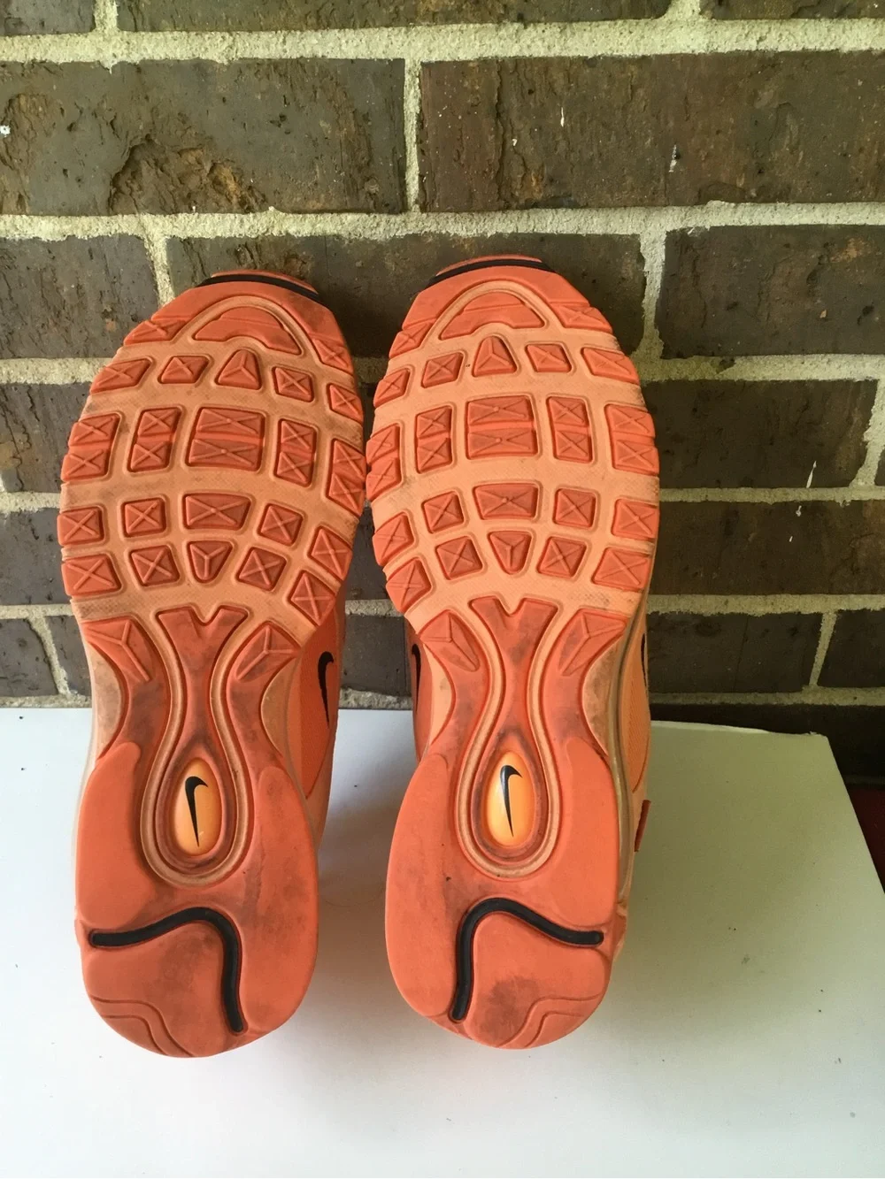 Nike Women’s Air Max 97 in Orange and Coral
